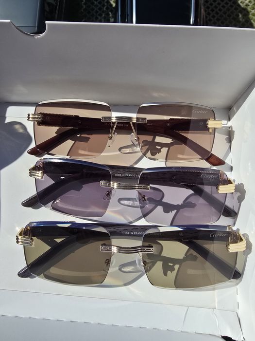 Cartier Heliomat, CT02593, made in France, ochelarii sunt transparenti iar la soare se coloreaza negru, verde sau maro. Pret per buc
